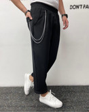 شلوار مردانه مام فیت مشکی طرح زنجیر دار