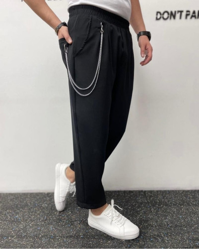 شلوار مردانه مام فیت مشکی طرح زنجیر دار