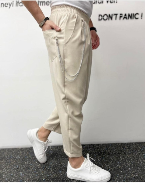 شلوار مردانه مام فیت کرم طرح زنجیر دار