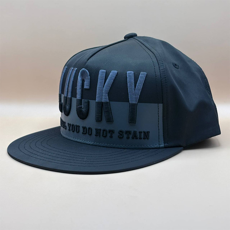 کلاه کپ مشکی مدل LUCKY با نوشته آبی دارای گلدوزی